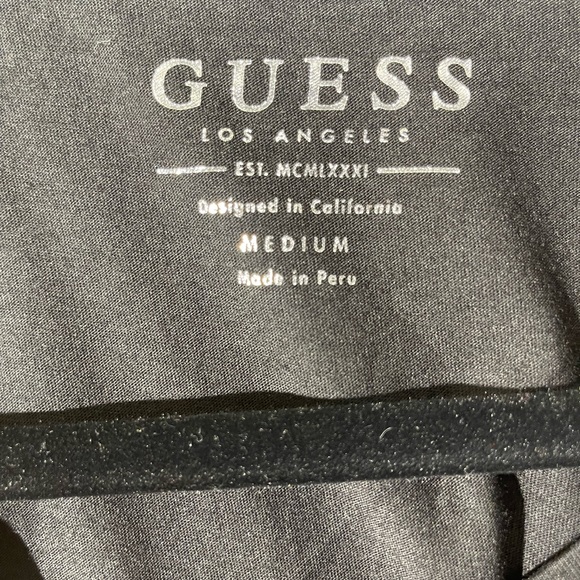 Guess Triangle Logo T-shirt Dress
Style # W73I42R1KP1 - Picture 8 of 8
